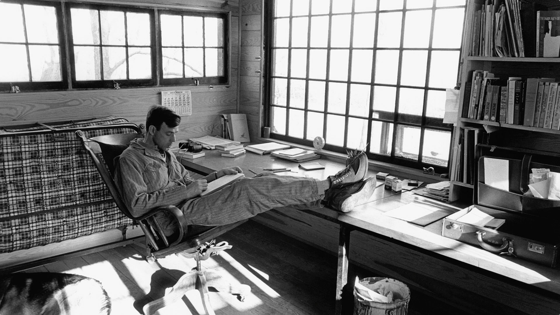 Wendell writing before his forty paned window in Port Royal, Kentucky.