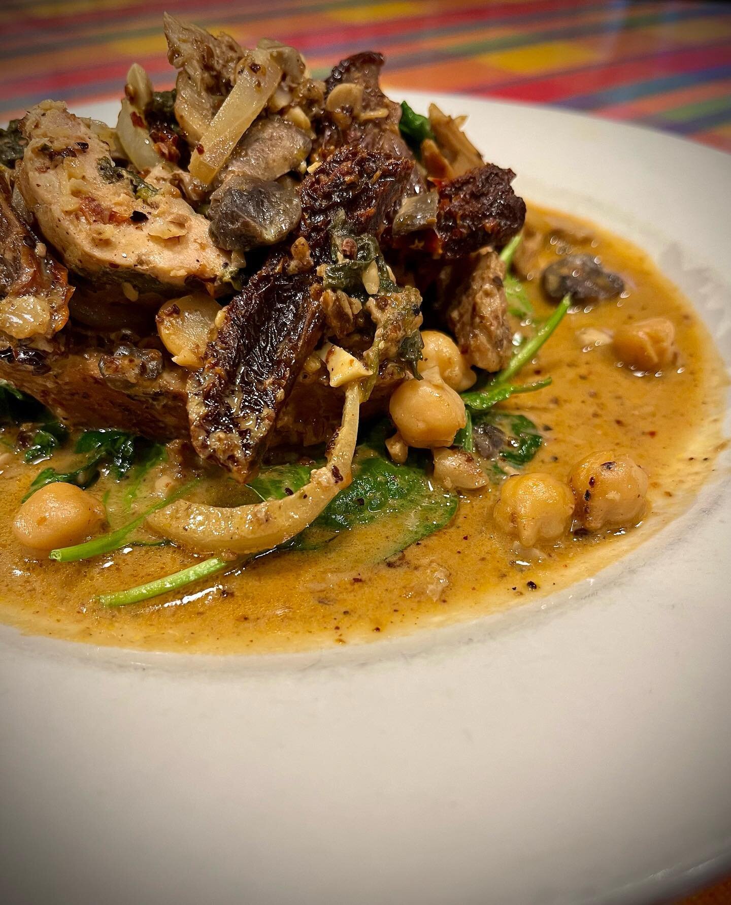 Weekend Dinner Special: Pork Loin stuffed with mushrooms &amp; spinach served with garbanzo beans, sun dried tomatoes and white onions in a coconut morita salsa. Served with white rice &amp; black beans. &iexcl;Provecho!