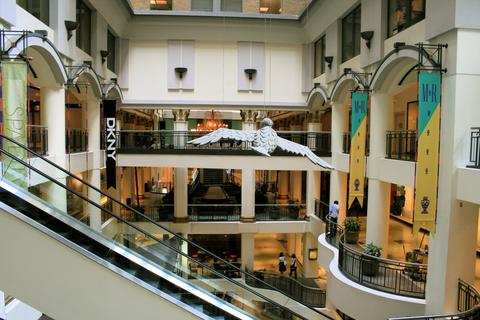 Inside the elegant Les Cours Mont Royal. Harry Rosen's expansion will see the store occupy 33,000 square feet over three floors. Image Source