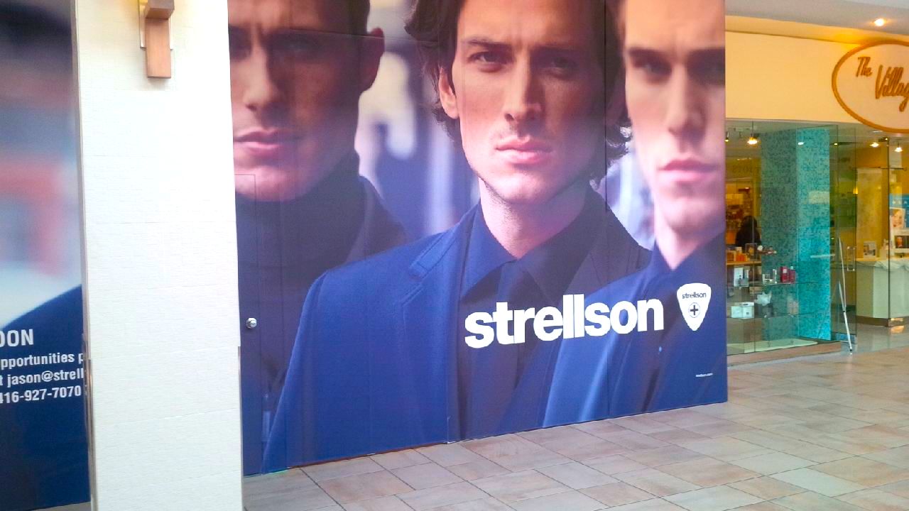 Hoarding over Bayview Village's new Strellson store, currently under construction. Photo: ACT7, Urban Toronto.