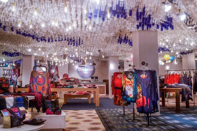 7,000 glass bottles hang from the ceiling of Montreal's Desigual store. Photo: http://journalmetrocom.files.wordpress.com