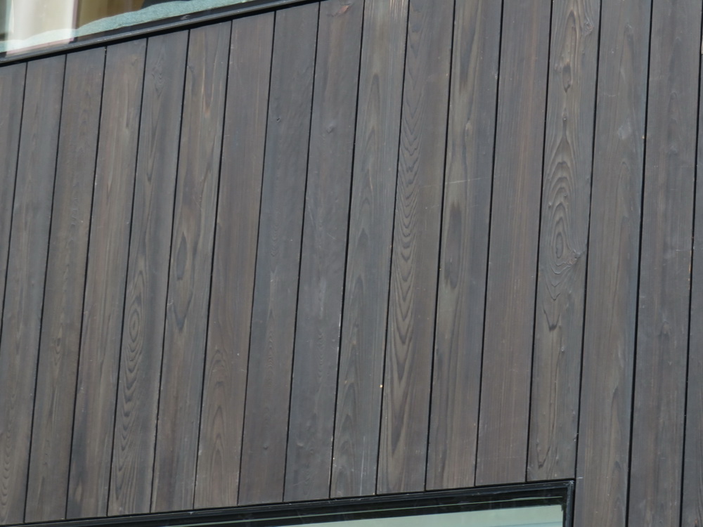 Wood paneling on the store's exterior. Photo by Greg