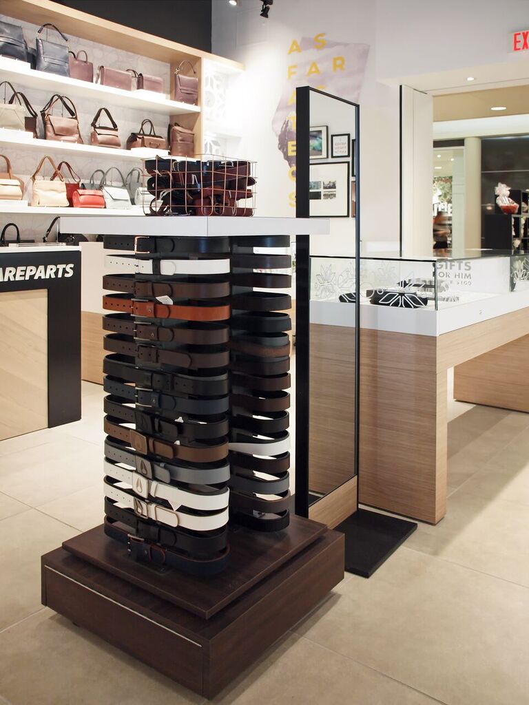 Belts attractively displayed on a high-quality wood podium. Photo: Peregrine.Build