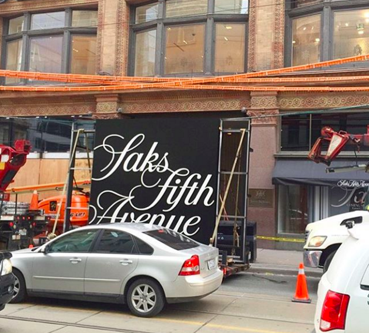 Saks signage being installed on the Queen Street store on Feb 6, 2016. Photo: Saks, via Instagram