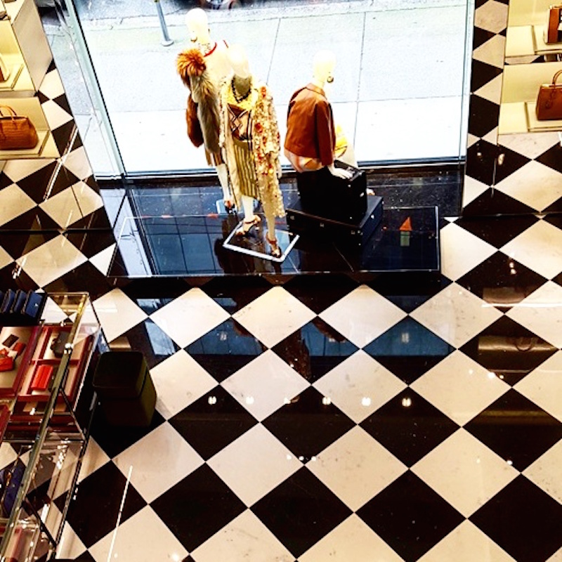Glossy marble floors in women's accessories on the ground floor. Photo: Helen Siwak of @Eco.Lux.Luv
