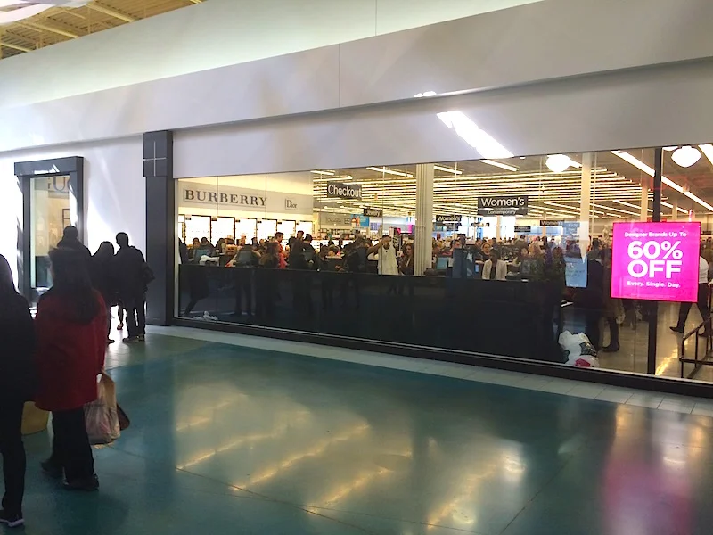 Window looking into the store from the mall. Photo: Norman Katz