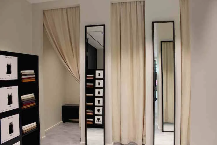 Spacious dressing rooms at the back of the store.&nbsp;