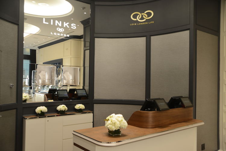 Another view of the cash desk, as well as a wall with Links' slogan 'Love London Life'. Photo: Tom Sandler