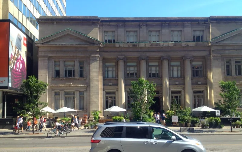 Vendors under umbrellas at Club Monaco, 157 Bloor St. W. in Toronto. 
