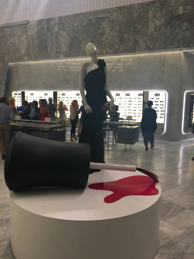 Fun display in the store, with the sunglasses department in behind. Marble features prominently throughout the store. Photo: Chantal Mizerski, Retail Council of Canada.