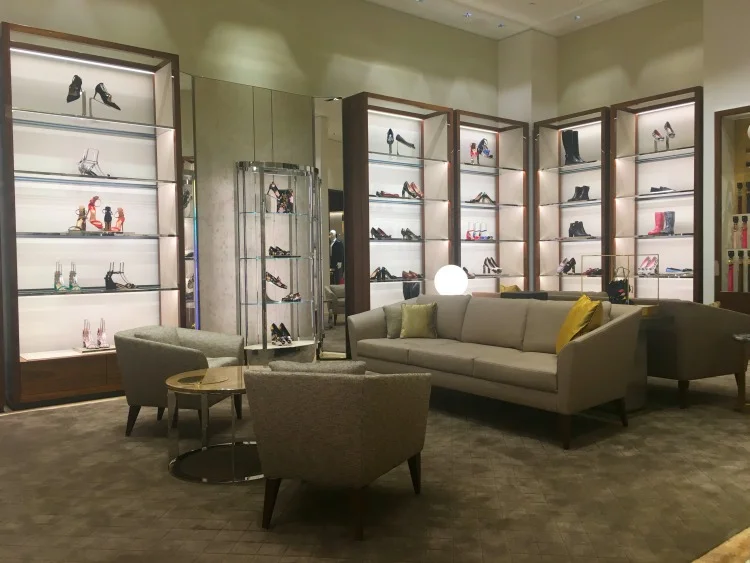 Women's footwear salon features plush carpeting and comfortable, residential-like seating.&nbsp;Photo:&nbsp;Chantal Mizerski, Retail Council of Canada.
