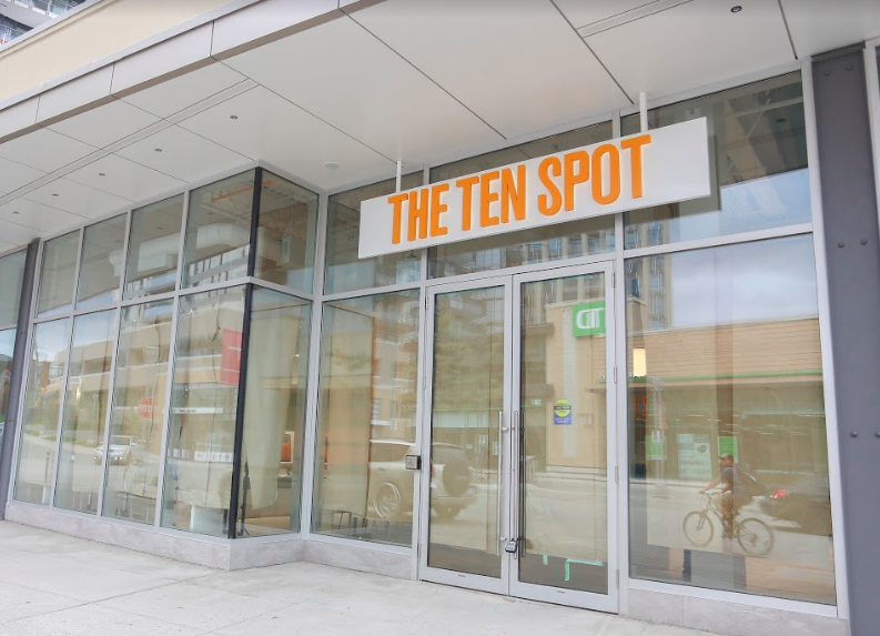 Paper over the windows at the soon-to-open CF Shops at Don Mills location. Photo: The Ten Spot.