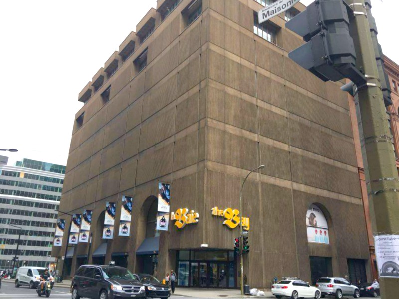 Extreme makeover: Current Boulevard de Maisonneuve facade to see overhaul. The stucco exterior will be removed and replaced with a dramatic Saks storefront. Photo: Maxime Frechette . 