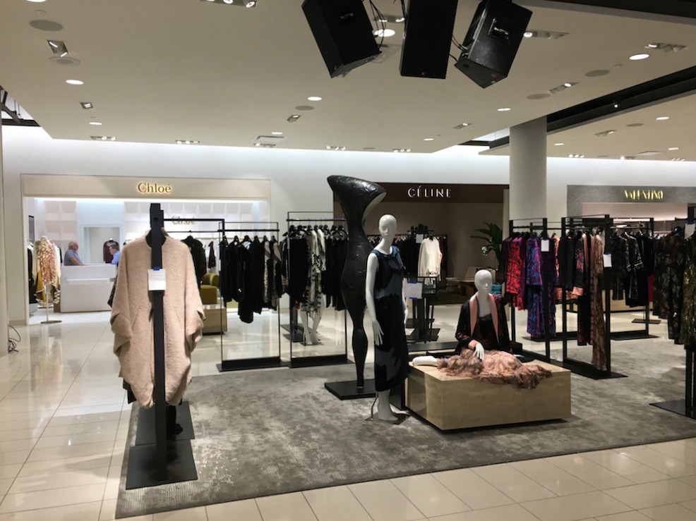 (Women's 'Collectors' designer floor, featuring fashions priced into the thousands)
