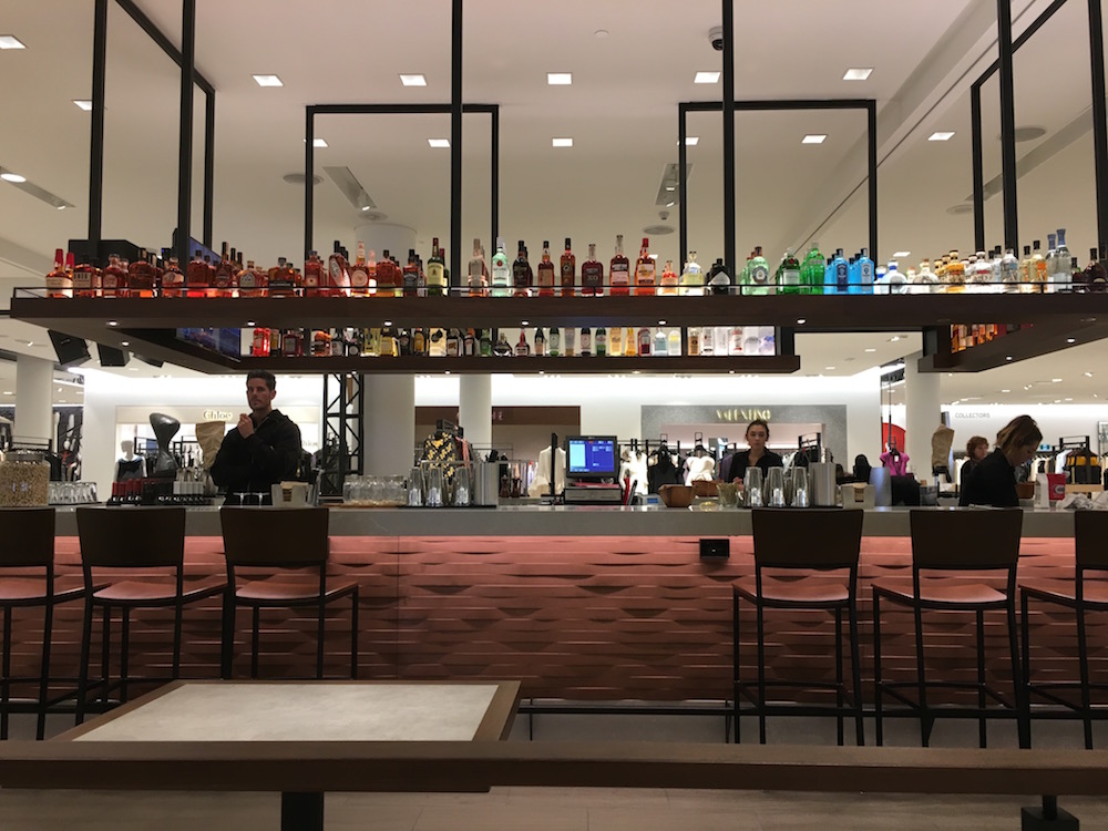 (Habitant Bar on the store's second floor. Valentino, Celine and Chloé boutiques can be seen behind it) 