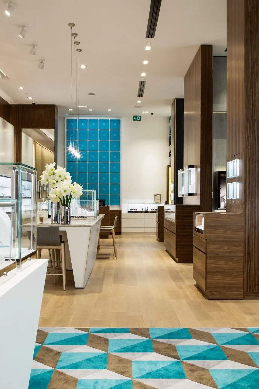 (The store's back wall features Birks' iconic blue boxes. photo: Ben Rahn/A-Frame)