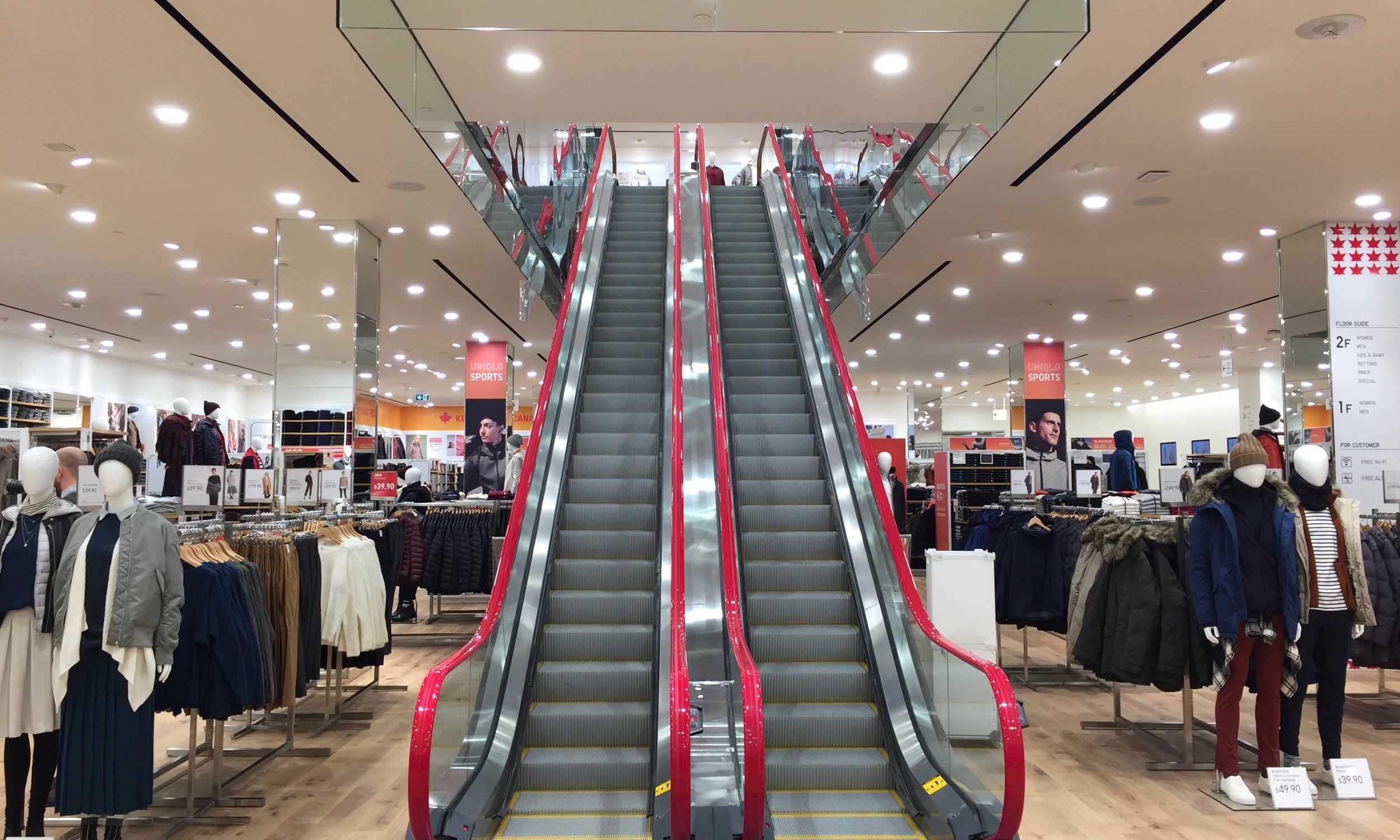 Customers are greeted by two large escalators that lead shoppers to more men's and women's collections.