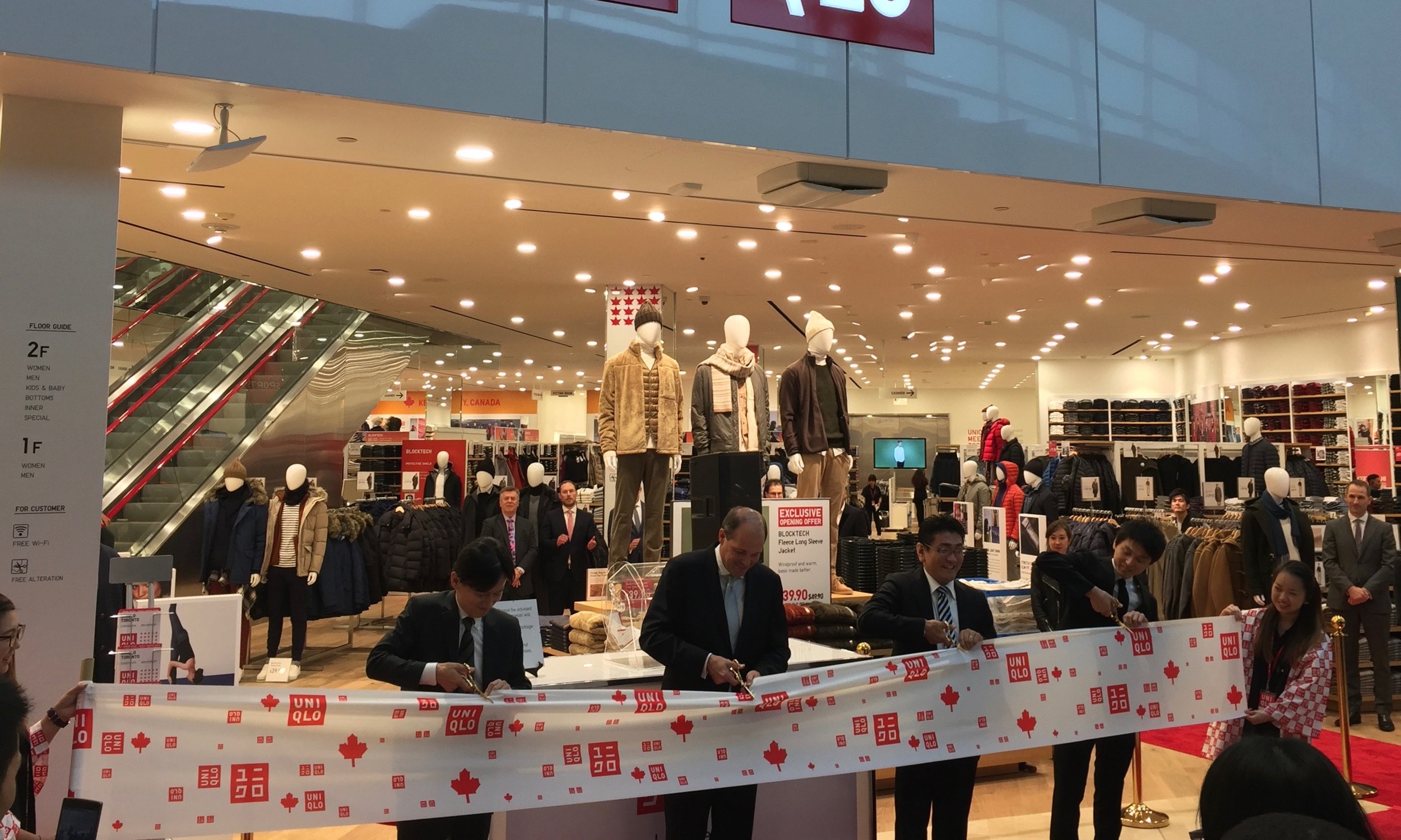 (Uniqlo Canada's CEO and COO cut the ribbon to the 25,500 square foot store)