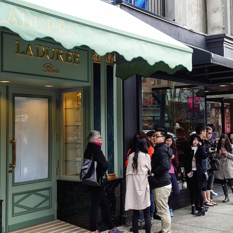 (lineup for the opening of ladurée on robson street in vancouver, march 2016. Photo: Helen Siwak) 