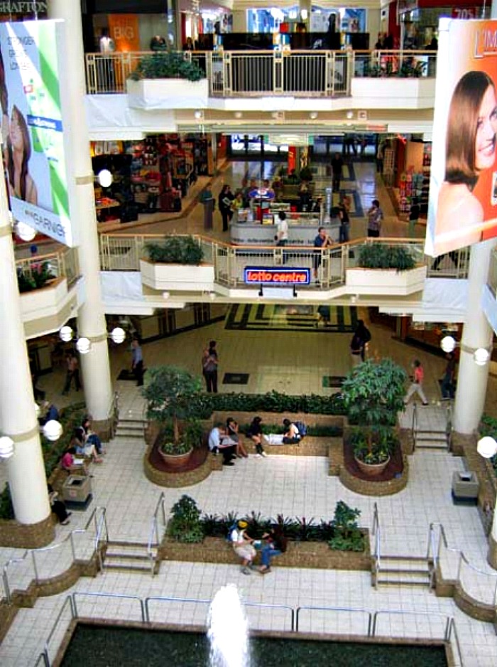 (former 'pacific centre north', looking down from the 3rd floor (now holt's women's designer floor) photo: city of vancouver)