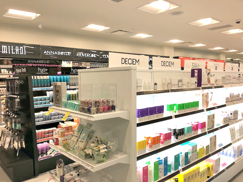 (the rexall drug store at yorkville village is the first in the chain to carry 'high-end' cosmetics) 