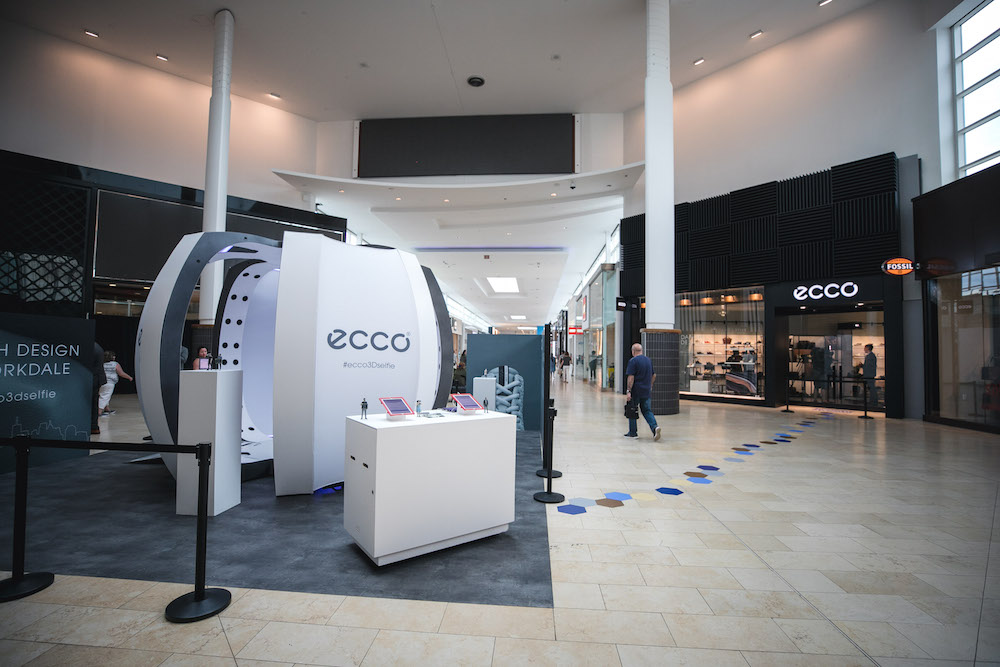 (promotional installation in front of the new yorkdale store. Until june 30, shoppers can have miniature versions of themselves created, via Toronto-based Selftraits ) 