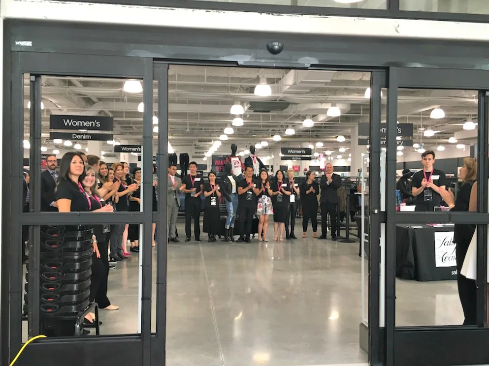 (staff gather to welcome shoppers to the park royal saks off 5th. Photo: Park Royal)&nbsp;