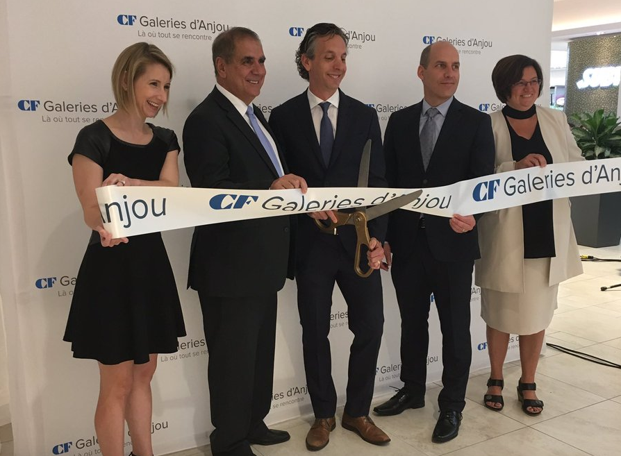 (Ribbon cutting at the Galeries d'anjou expansion unveiling. PHoto: cadillac fairview)&nbsp;