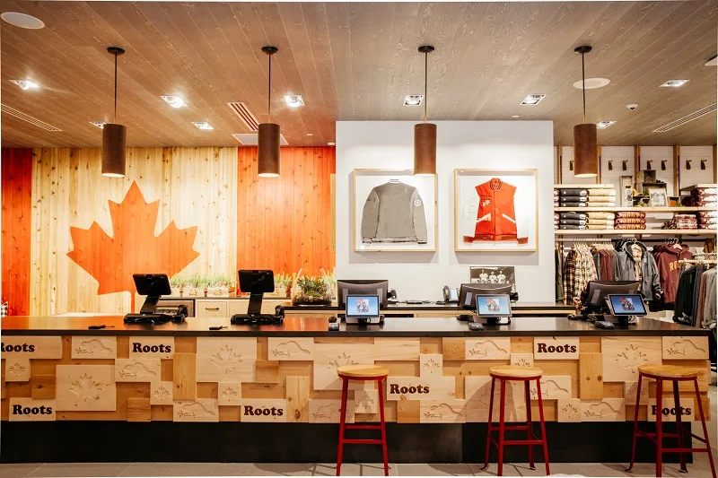 (cash desk with locally supplied millwork.&nbsp;Photo: Roots)&nbsp;