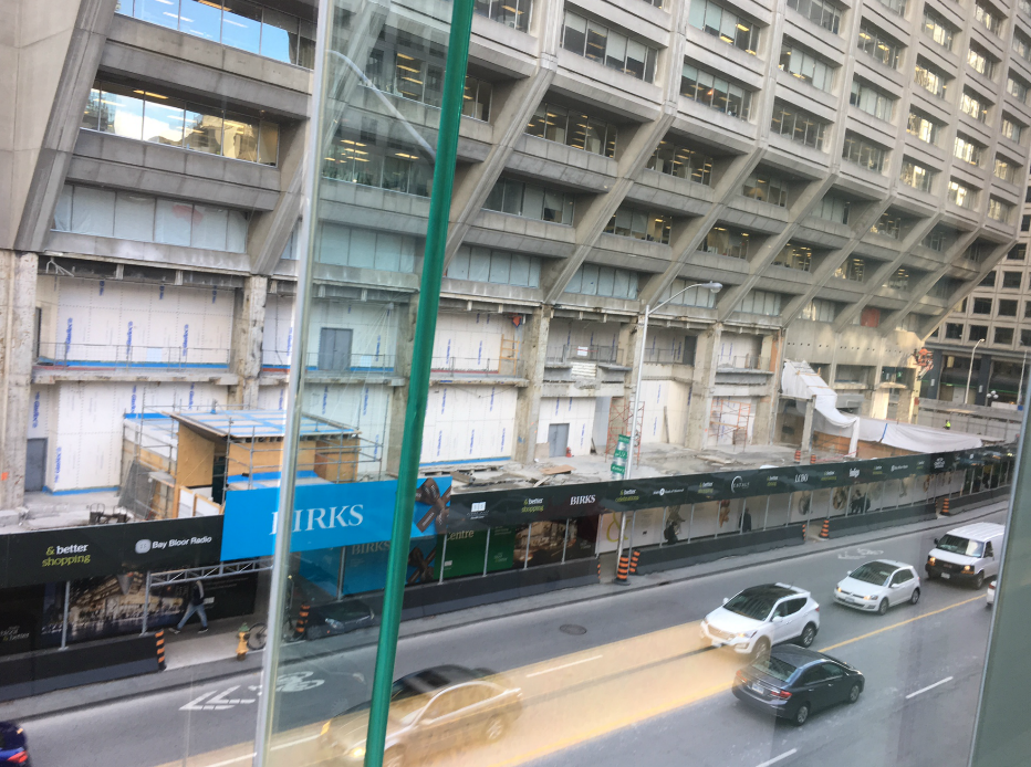 (podium overhaul: Looking down at construction at Manulife centre at 55 Bloor St. W., which will see Eataly open a 50,000 square foot space over three floors in 2019. Birks has temporarily relocated to the corner of Bloor and Balmuto Streets while its former space is overhauled. Photo taken October 25, 2017 from the Café at Holt's by Craig Patterson)&nbsp;