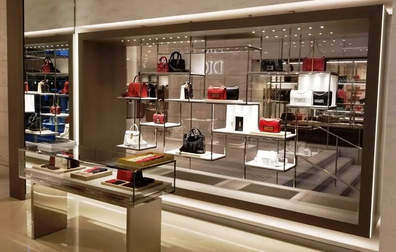 (Inside the new Dior boutique -- the stairs on the other side of the window lead downstairs to the store's Granville Street entrance. Photo: Helen Siwak) 