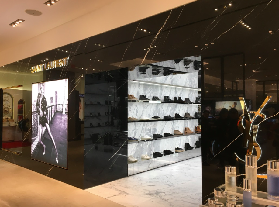 [This photo was taken from within Holt Renfrew's ground floor cosmetics hall, showing the entrance to the new Saint Laurent. Men's shoes can be seen in the photo]