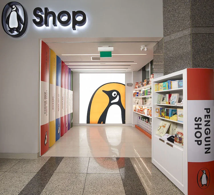 ['Penguin shop' on the street level at 320 Front st. W. in Toronto]