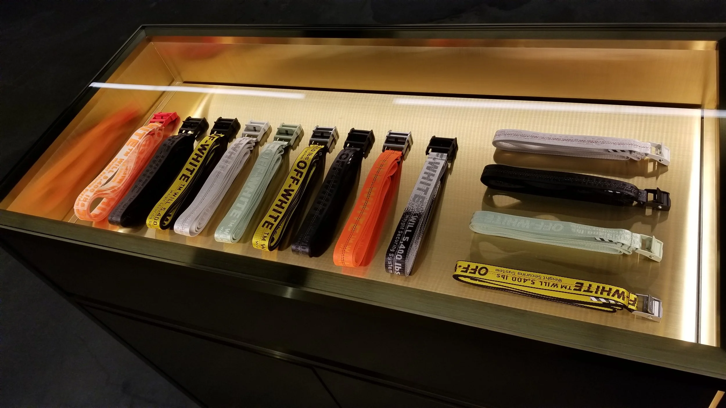 [Display with belts, priced at $275 each. Photo: Helen Siwak]
