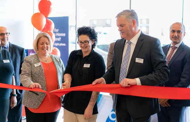 Members of the Wellwise team officially open the store in Etobicoke during the ribbon-cutting ceremony on Saturday, April 7.