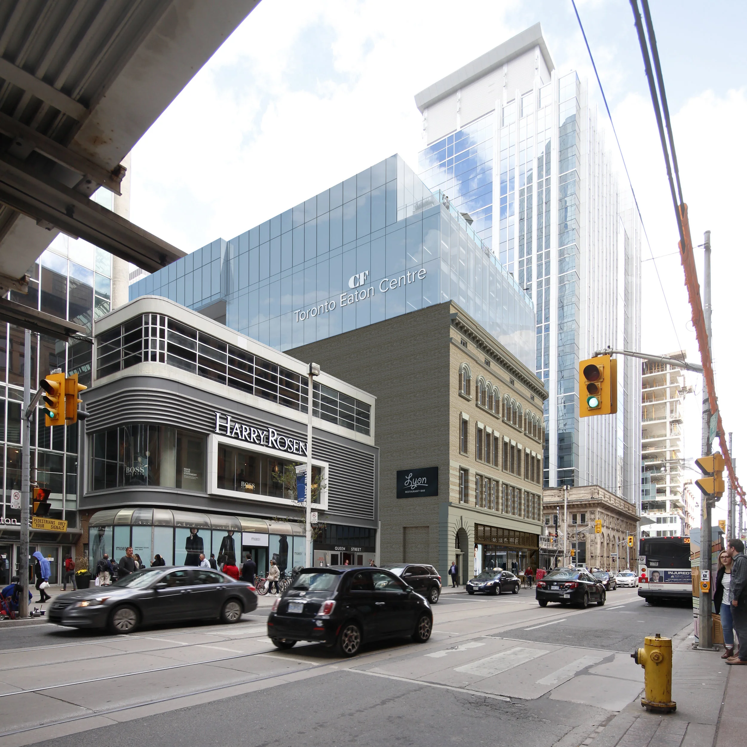 Looking eastward along Queen Street West from the entrance of Hudson's Bay/Saks Fifth Avenue towards 2 Queen Street West.&nbsp;