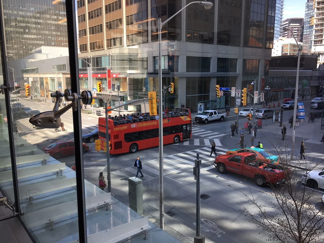 Looking from within the store on the second floor down to the intersection of Yonge &amp; Bloor