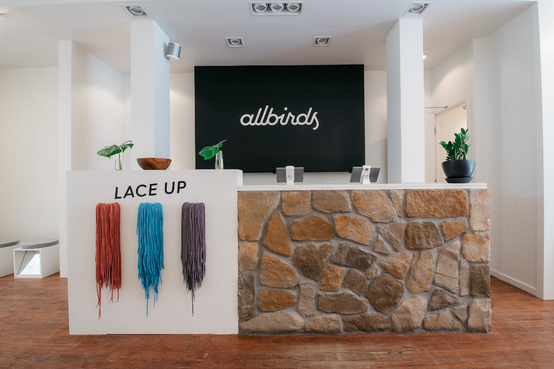 Cash Desk with shoe laces displayed. Photo: Allbirds