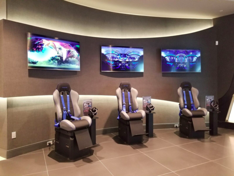 (VIRTUAL REALITY SEATING AREA at Samsung store in CF Toronto Eaton Centre. CUSTOMERS WERE ENJOYING THE EXPERIENCE WHEN WE VISITED THE STORE. PHOTO: SAMSUNG) 