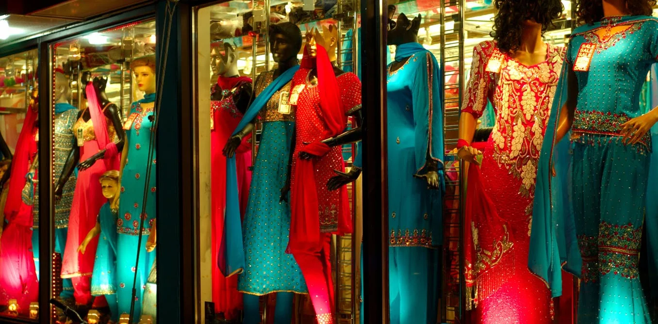 Small business owners provide a service by offering goods not found elsewhere and employing local community members. Here, a sari shop window in Toronto’s ‘India Bazaar.’&nbsp; Ian Muttoo ,&nbsp; CC BY-NC