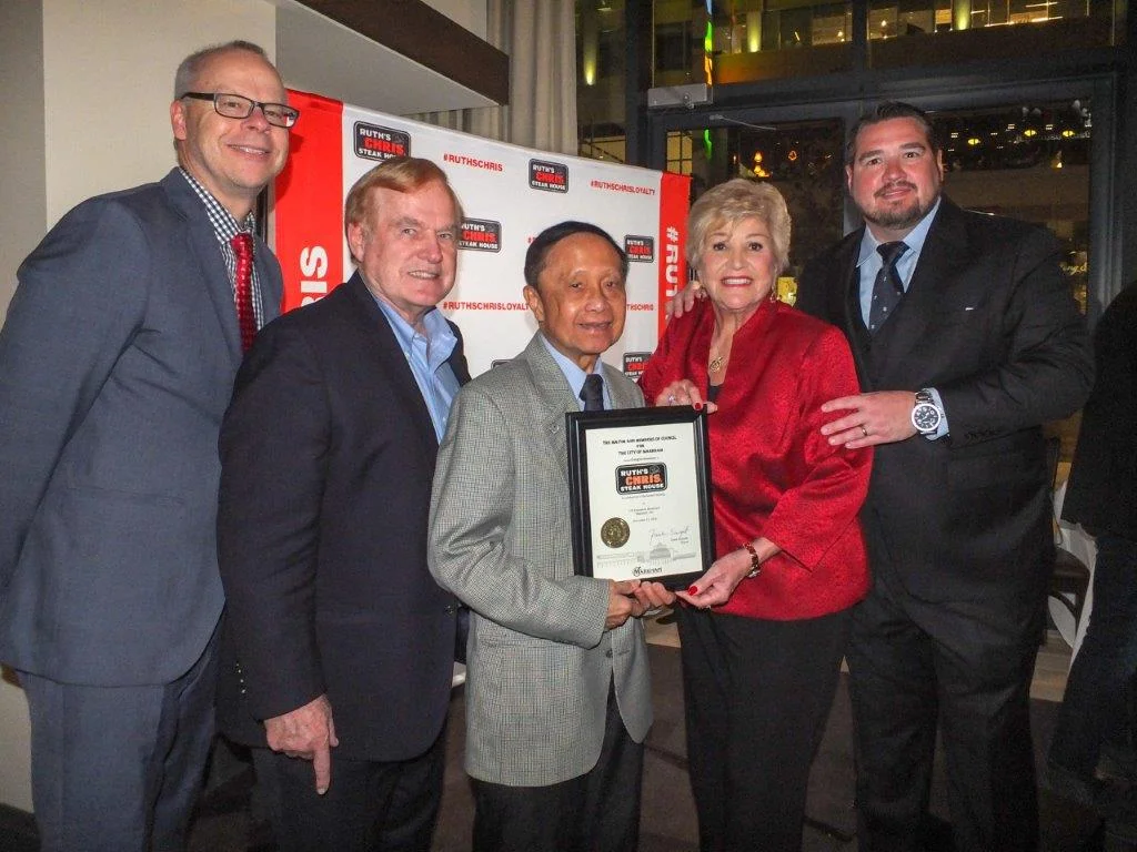 Celebrating the Grand Opening of Ruth’s Chris Steak House – Markham, Regional Councillor Jim Jones (second from left) and Ward 8 Councillor Alex Chiu (third from left) brought greetings on behalf of Mayor Frank Scarpitti and Members of City Council. Located at 170 Enterprise Blvd in Markham, shown (l-r ) are Ruth’s Chris – Markham General Manager Mike Berlanguet, Councillors Jones and Chiu, with co-Franchisees Lana Duke and R. David Duke, who now have three restaurants in the Greater Toronto Area. (Photo: Darrell Hein)