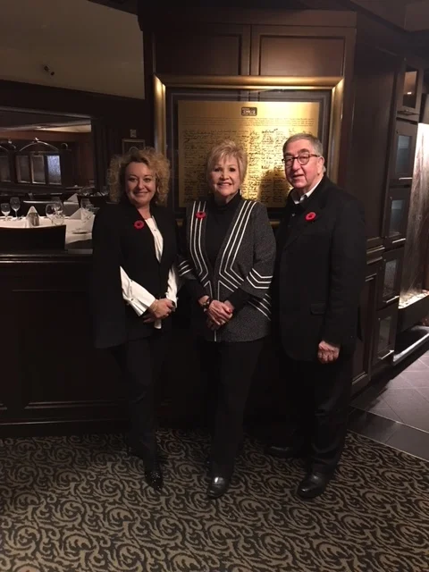 Retail Insider’s Yana Brikker with Lana Duke and David Eisenstadt, at the Toronto Hilton, in front of a bronzed commemorative plaque marking the 5th Anniversary of Ruth’s Chris in Toronto