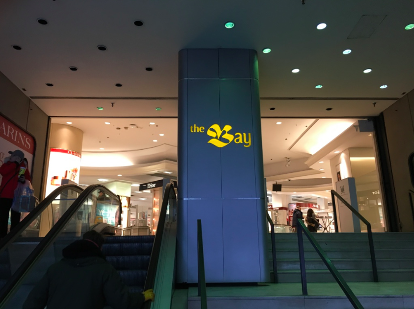 Despite signage having been updated in most Hudson’s Bay stores in Canada, the location at Yonge & Bloor in Toronto has not, raising questions about the future of the store.