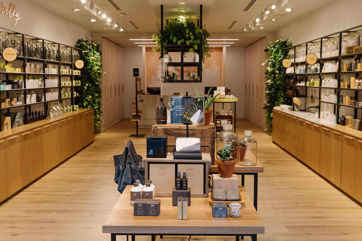 Inside the CF Richmond Centre store, featuring natural wood accents and metal. Project PHOTO: PEREGRINE