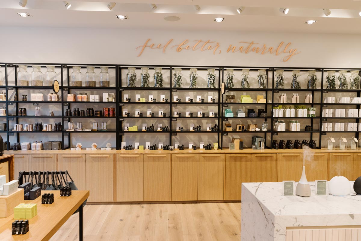 Displays in the CF Richmond Centre store, featuring natural wood, metal and marble. Fixtures and PHOTO by: PEREGRINE