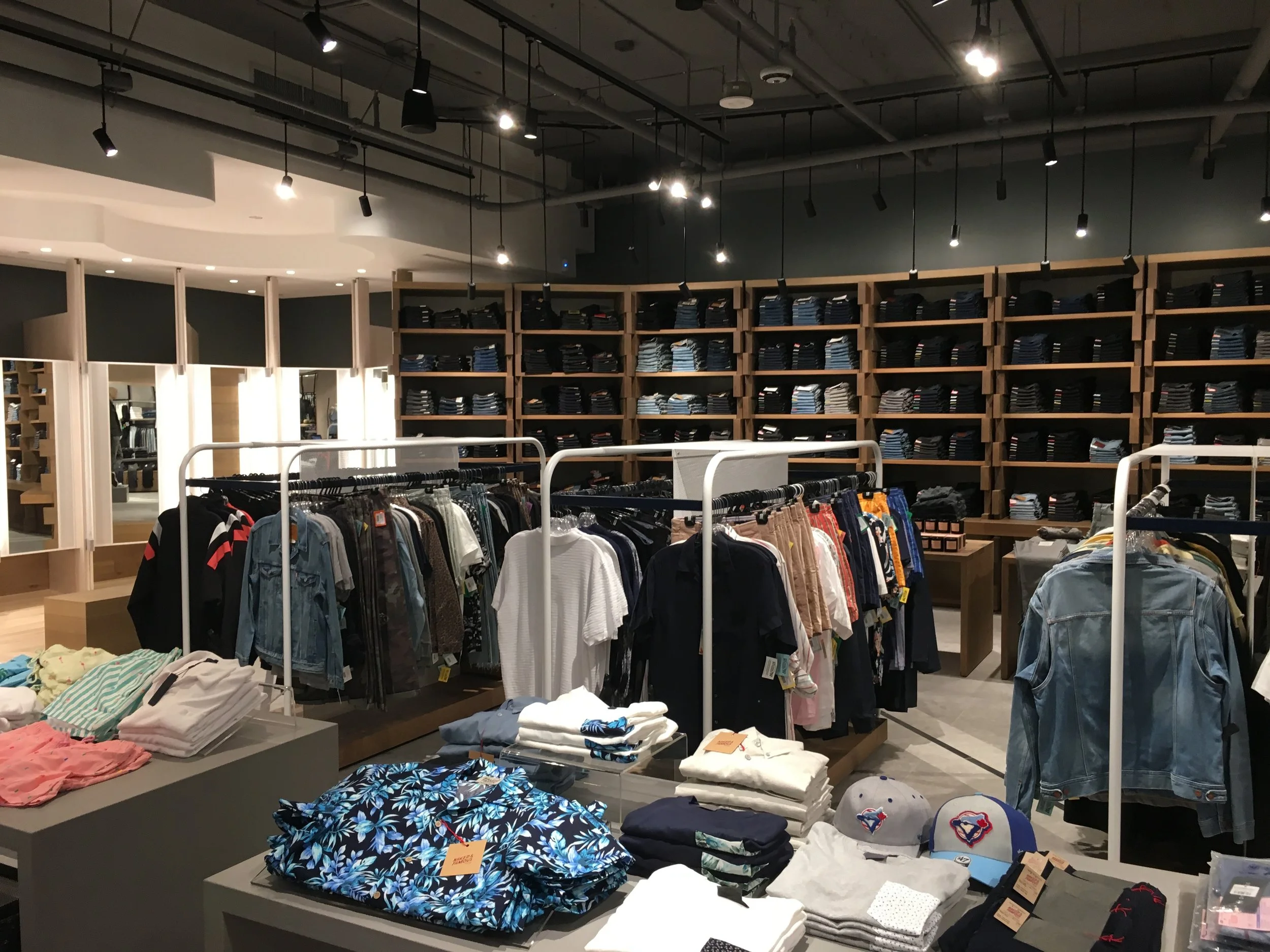 Looking towards the men’s denim wall in the new store. photo: craig patterson