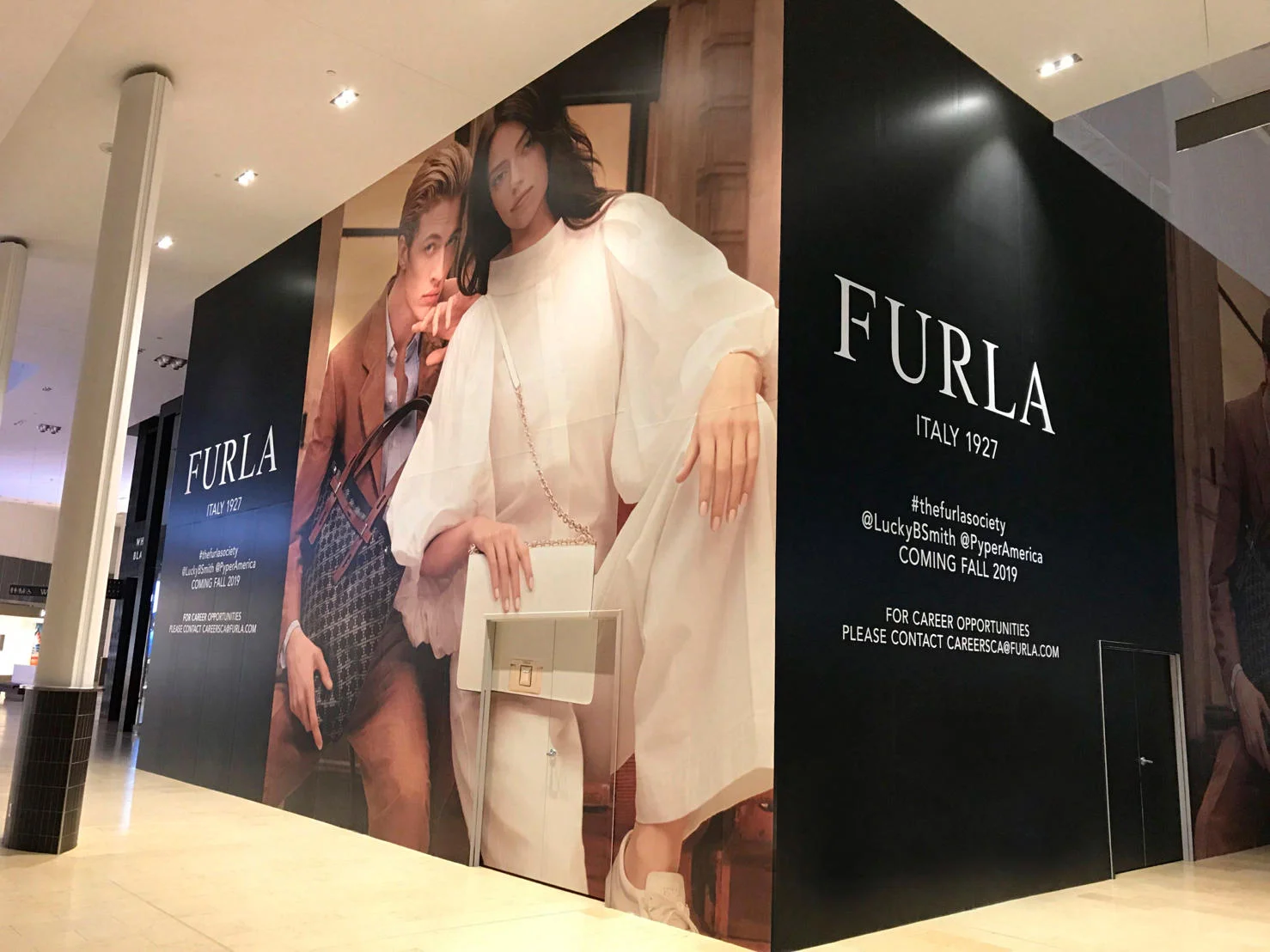 CONSTRUCTION HOARDING AT FURLA’S NEW YORKDALE LOCATION. Photo: Jeff Berkowitz