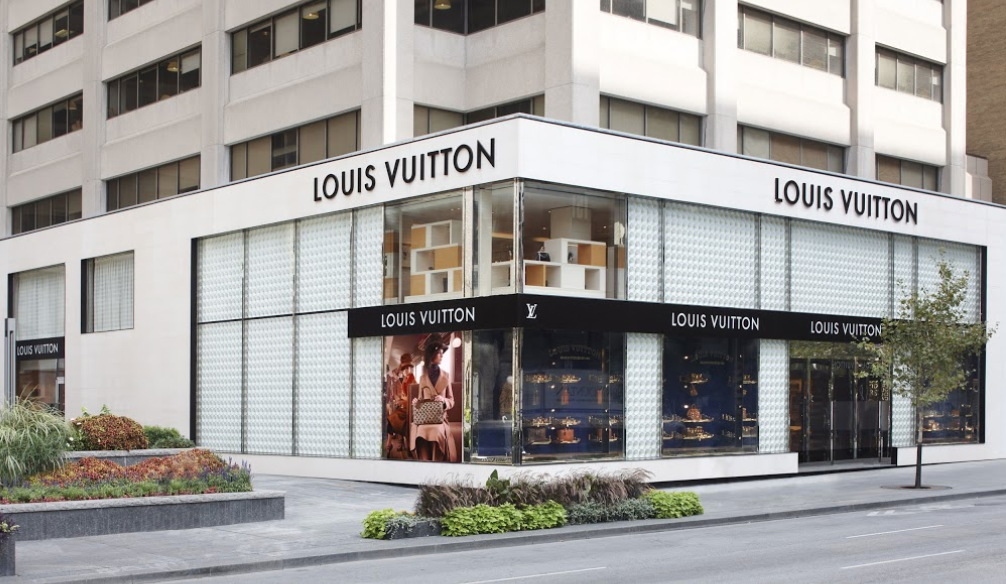 Louis Vuitton women's handbags displayed in the window of Holt Renfrew  department store, Vancouver, BC, Canada Stock Photo - Alamy