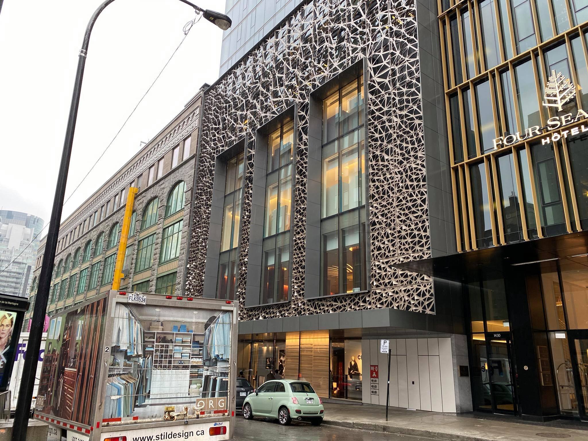 The ‘Café Holt’ will locate on the second floor of Holt Renfrew Ogilvy, directly above the small green car in this photo. Image via Maxime Frechette, taken March 10 2010.