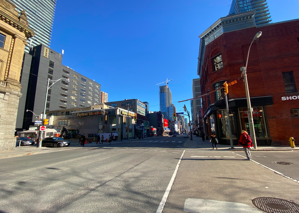 Yonge Street looking south to Charles Street. Recent violent incidents have led to increased security at the shoppers Drug Mart STore on the corner.